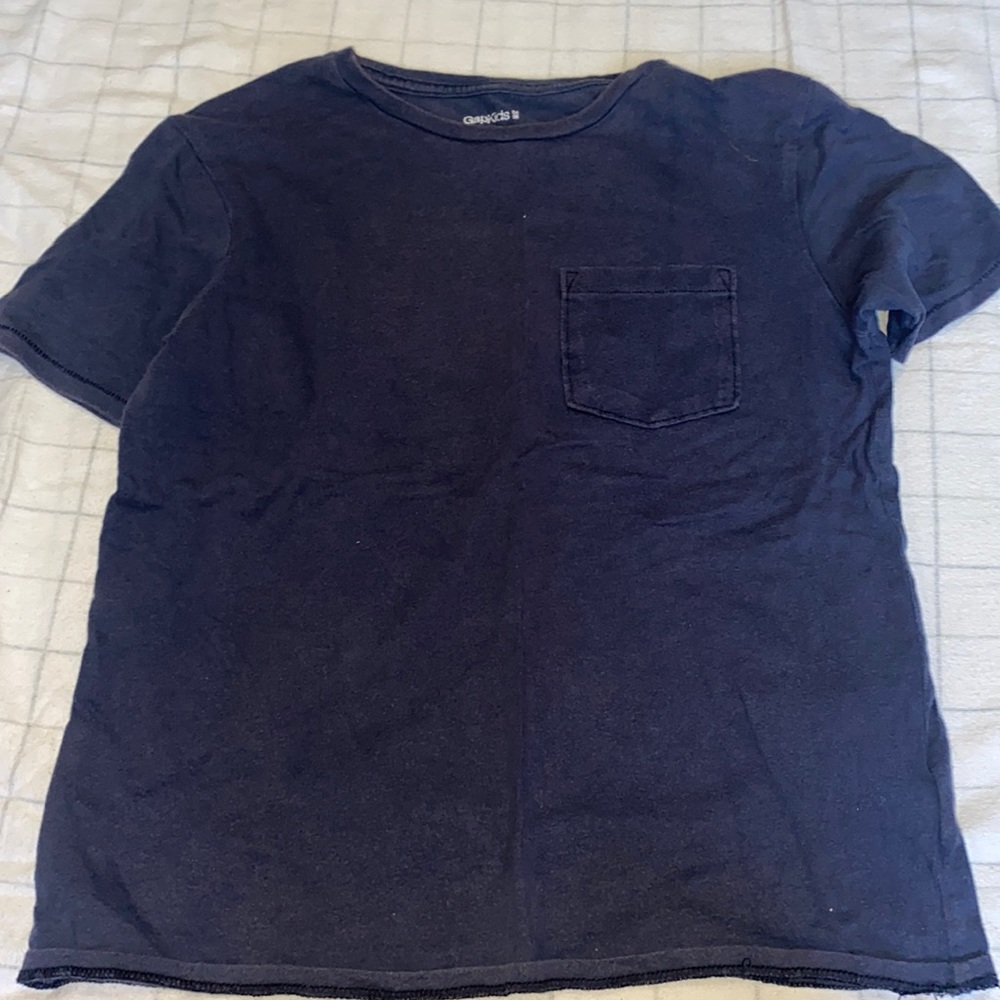Blue short sleeved tee shirt.